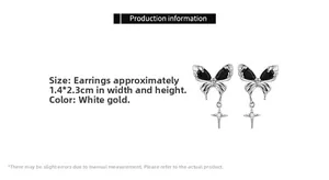 Detailed view of black bow earrings with zircon stones and star pendant, size 1.4x2.3cm