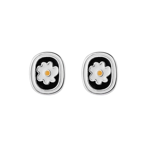 Minimalist oval flower stud earrings with white petals and black enamel on silver metal