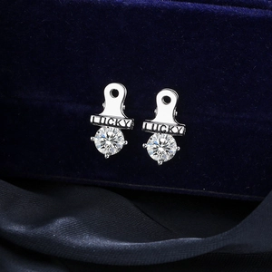 LUCKY engraved silver stud earrings with sparkling round cubic zirconia for men
