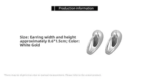 Detailed view of silver water drop earrings in white gold finish with 0.6x1.5cm sizing