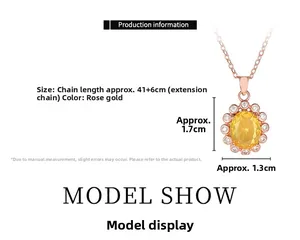 Détail du collier fleur en or rose avec cristal jaune ovale et oxydes de zirconium
