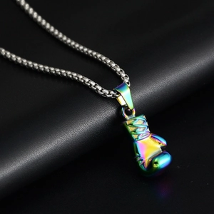 Macro detail of boxing glove pendant with colorful iridescent plating on steel chain