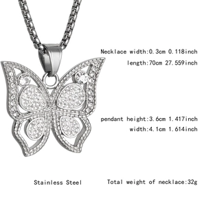 Detail view of iced out butterfly pendant and dimensions of the stainless steel chain