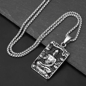 Hip hop style stainless steel necklace featuring a vintage silver Buddha pendant on a slate