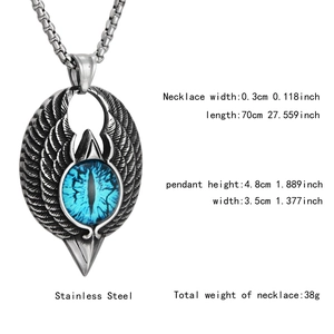 Detailed view of punk stainless steel necklace featuring winged blue eye pendant with box chain