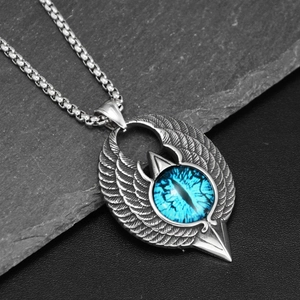 Detailed close-up of Gothic eagle wings pendant with a bright blue dragon eye stone