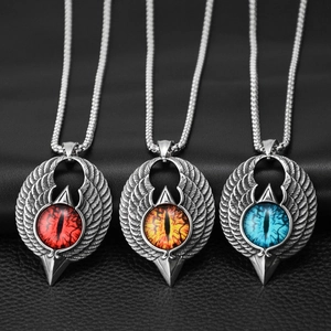 Detailed view of Gothic evil eye pendant necklaces with wings in red, yellow and blue
