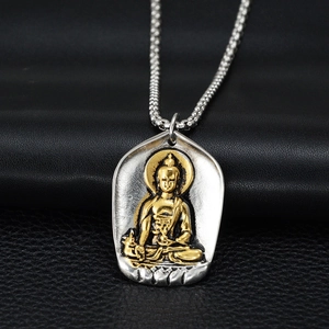 Detail of two-tone gold and silver Buddha pendant necklace with retro steel bead chain