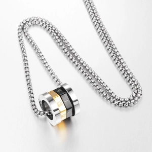 Macro shot of titanium steel triple stacked rings pendant with Roman numerals engraving
