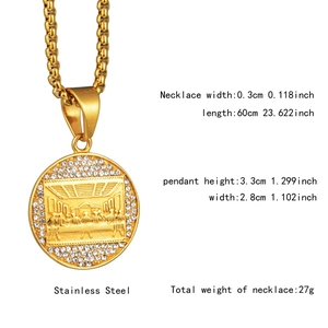 Macro detail of gold stainless steel round pendant with Last Supper relief and zircons