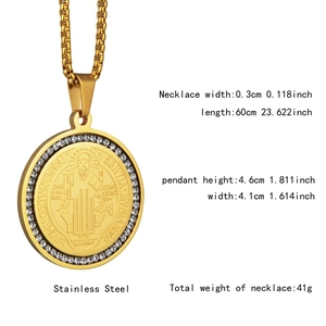 Detail of St. Benedict medal necklace in gold steel with white zircon inlays