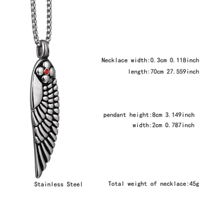 Detailed view of silver feather pendant with red stone and stainless steel chain specs