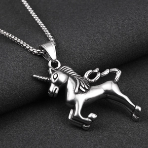 Close-up of a silver stainless steel unicorn pendant with a durable metal box chain