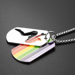 Macro view of double-layer stainless steel tag necklace with female silhouette cutout