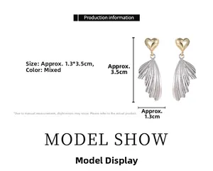 Detailed size chart for two-tone heart wing earrings measuring 1.3cm wide and 3.5cm high
