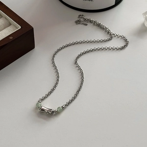 Elegant bamboo joint pendant necklace with light green beads and fine silver chain link