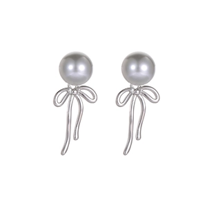 Elegant silver bow earrings featuring lustrous grey pearls with a versatile hanging design