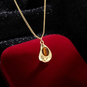 French vintage teardrop tiger eye stone necklace with gold-plated wavy bezel pendant