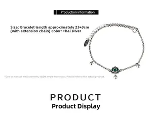 Detailed view of Thai silver anklet featuring green lotus charm and S925 engraved tag