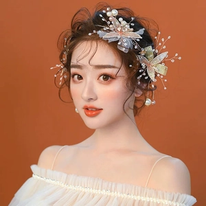 Serre-tête de mariée étincelant avec fleurs en strass et papillons en maille pour mariages