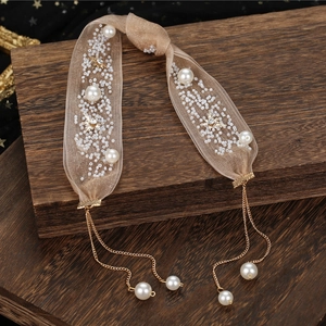 Bijou de cheveux pour mariée en maille champagne avec perles et étoiles dorées