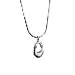 Minimalist silver snake chain necklace with an abstract irregular geometric hollow pendant