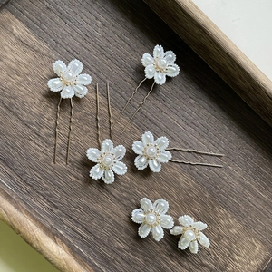 5-piece bridal hair pin set with handmade white pearl flower designs for wedding styling