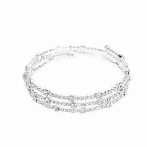 Macro detail of three-row silver elastic bracelet with shimmering clear rhinestones