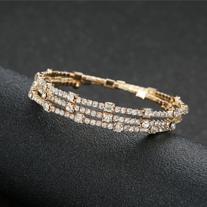 Elegant three-row gold crystal elastic bracelet with sparkling rhinestones for women