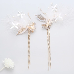 Fairy bridal pink feather hair clips with long rhinestone tassels and gold butterfly accents