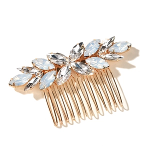 Elegant bridal hair comb with gold metal base featuring marquise opal and rhinestone leaves