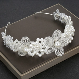 Elegant bridal floral headband with white pearls and crystal beads on silver metal base