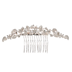 Detailed macro view of 10-tooth metal bridal hair comb with floral rhinestone accents