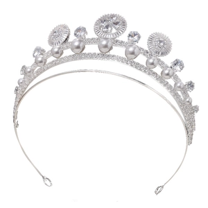 Baroque bridal crown with white pearls and sparkling zircons on silver frame