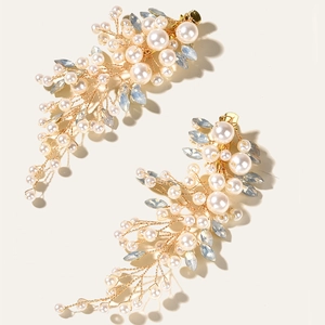 Elegant gold leaf bridal hair pins with white pearls and blue crystals for weddings