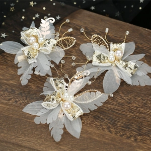 Elegant 3-piece bridal hair clip set with gold sequins, white tulle leaves, and pearls