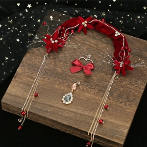 Elegant burgundy velvet bridal headband with gold tassels and rhinestone flower detail