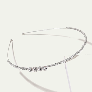 Elegant silver alloy headband with pave rhinestones and four central crystal stones