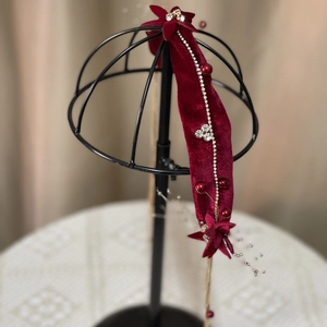 Elegant red velvet bridal headband with rhinestone chain and floral bead accents