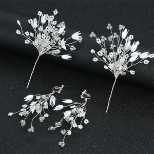 Handmade bridal hairpins and clip-on earrings set with white resin flowers and pearls