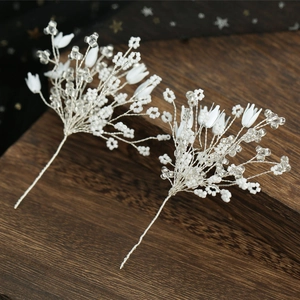 Elegant bridal hairpins set with white pearls and crystal beads on silver wire