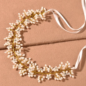Handmade bridal headband with white pearls and crystals on golden wire with silk ribbons