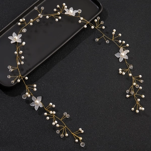 Handmade gold bridal hair vine with white flowers, pearls and crystal beads for weddings