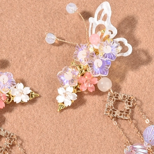 Exquisite butterfly flower hair accessory with colorful tassels and golden metal base