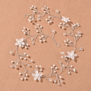Elegant silver bridal hair vine with handmade white flowers and pearls for wedding