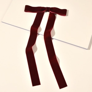 Elegant deep burgundy velvet long ribbon bow hair clip with a vintage French aesthetic finish