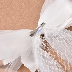 White bridal mesh bow hair clip with silver metal alligator clamp for wedding veil