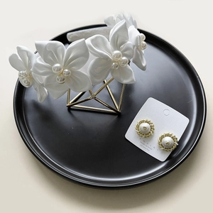 Elegant white satin camellia headband with pearls and matching vintage earrings set