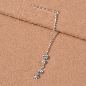 Close-up of silver rhinestone tassel hairclip with sparkling crystal fringe detail