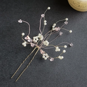 Pink crystal and white pearl bridal hair pin with golden wire for wedding hairstyles
